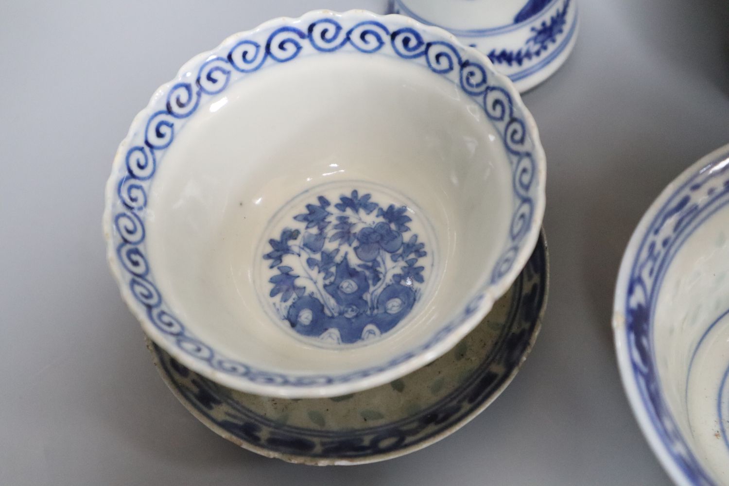 A Chinese blue and white baluster vase, 17cm, three Chinese bowls and four stands